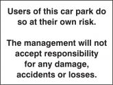Cars Parked at Owners Risk Sign