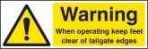 Warning when operating keep feet clear of tailgate edges sign