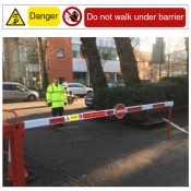 Do not walk under barrier sign