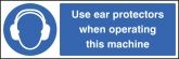 Use ear protectors/operating machine Sign