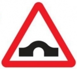 Hump bridge ahead road sign (528)