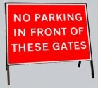 No parking in front of these gates Freestanding Road Sign