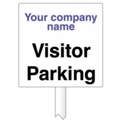 Visitor Parking sign on a post